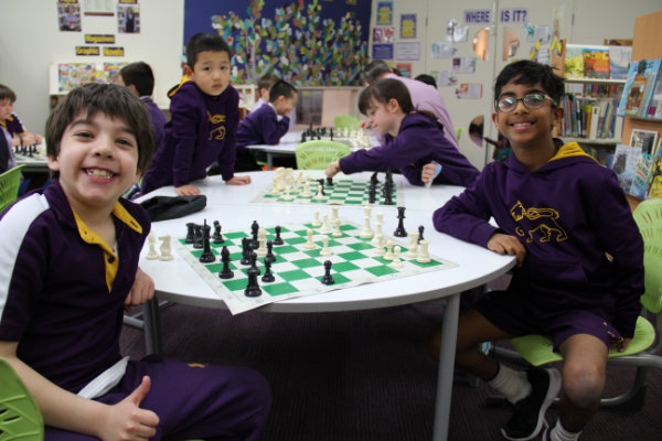 chess kids smiling